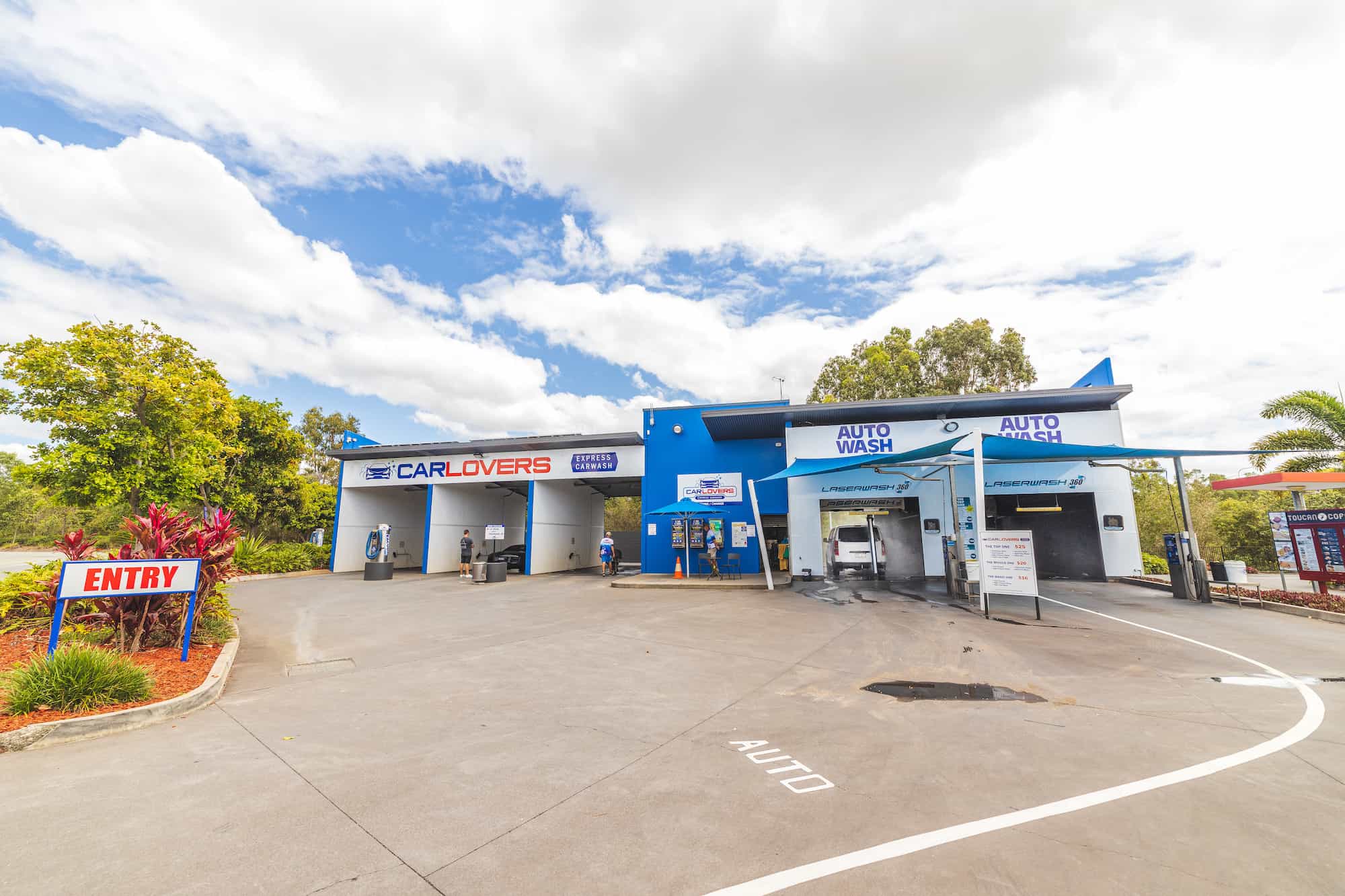 Car Lovers Express car wash at Coomera captured with customers washing their cars